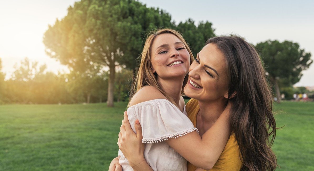 Beautiful women smiling and having fun in the park